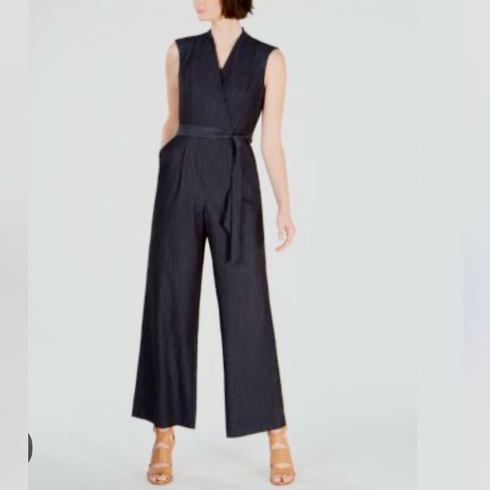 Elegant Calvin Klein
Belted Denim Jumpsuit